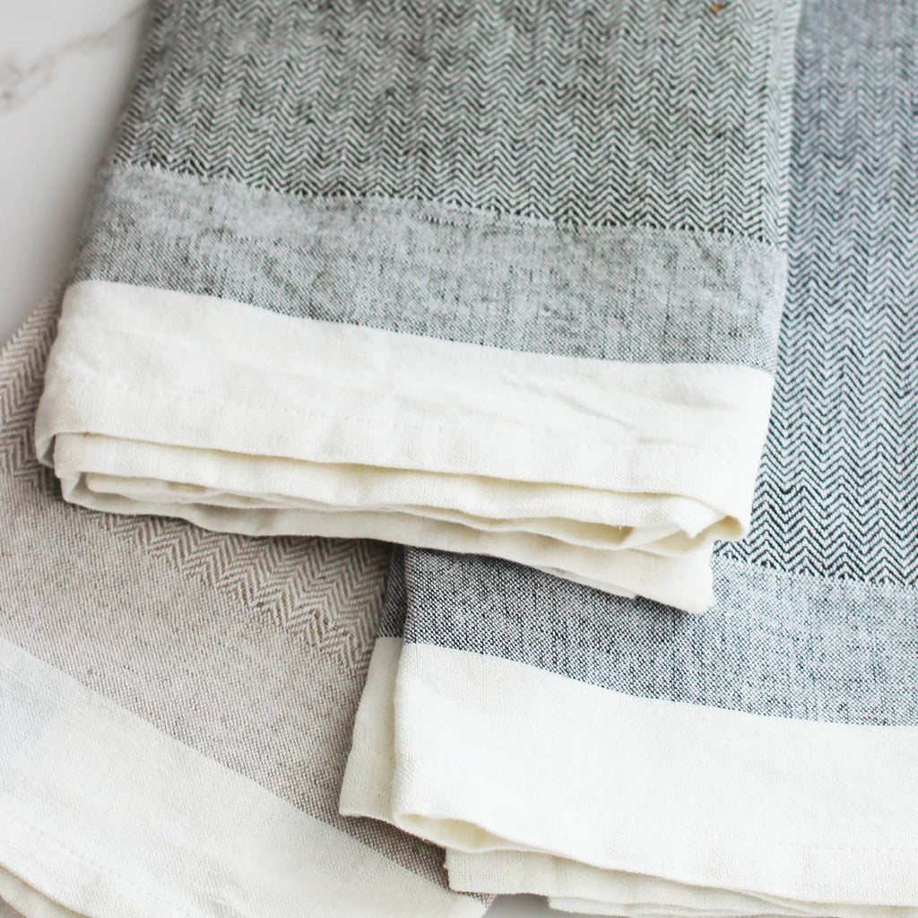 dark slate herringbone tea towel on a white background