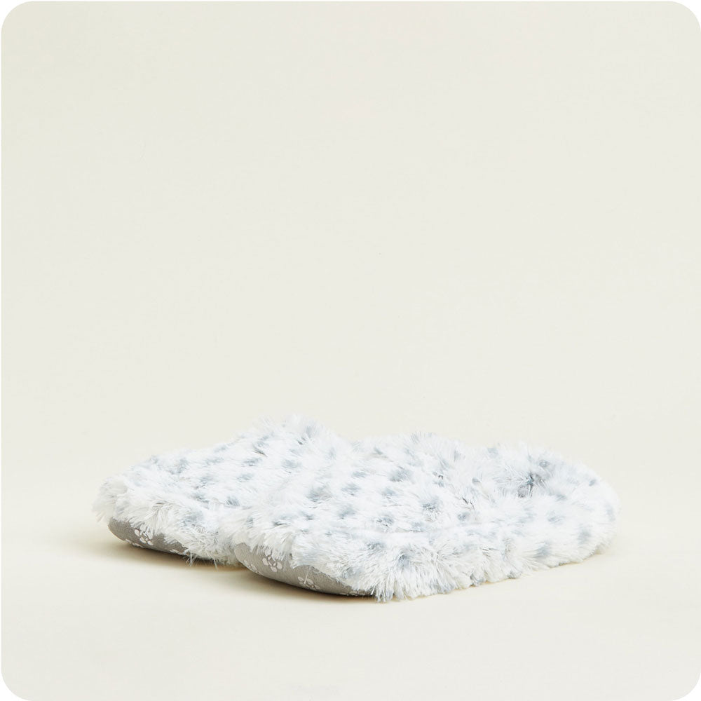 warmies snowy slippers on a cream background