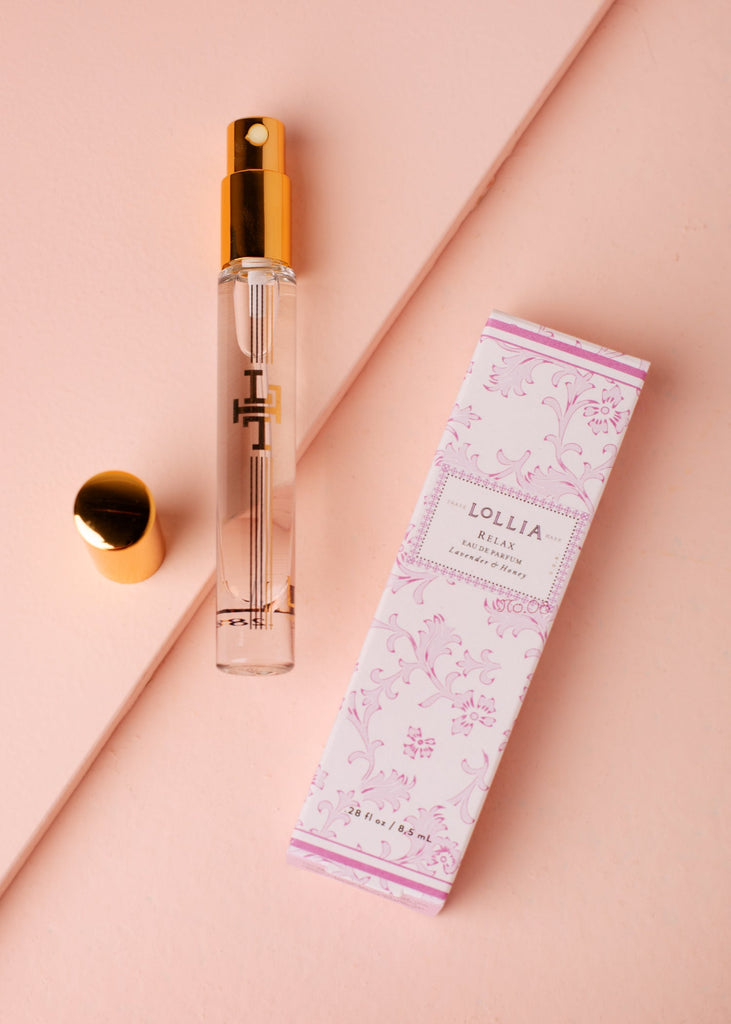 lollia relax perfume on a pink background