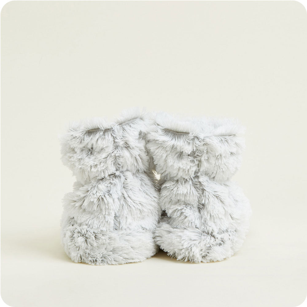 warmies gray marshmallow warmies boots on a cream background