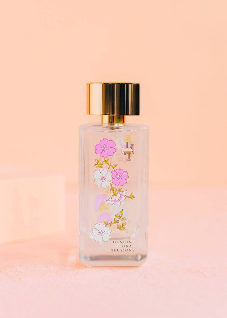 lollia relax perfume on a pink background