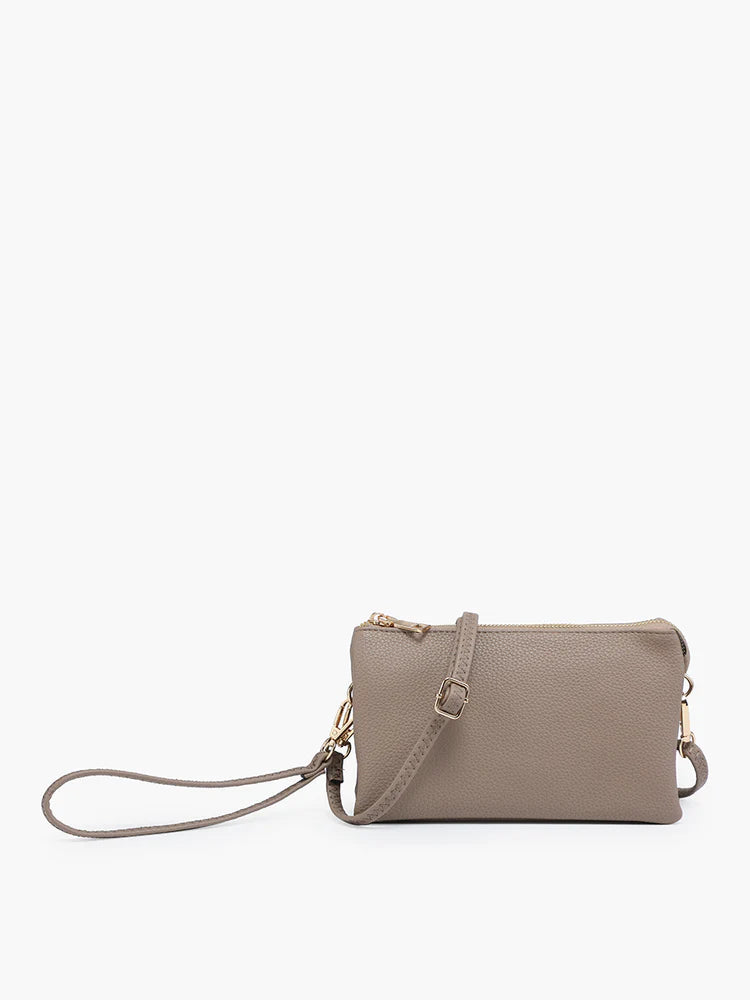 riley crossbody purse on a white background