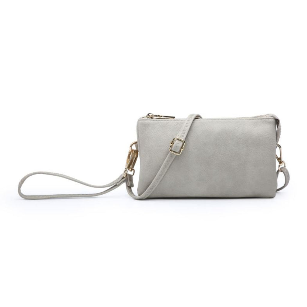 riley crossbody purse on a white background