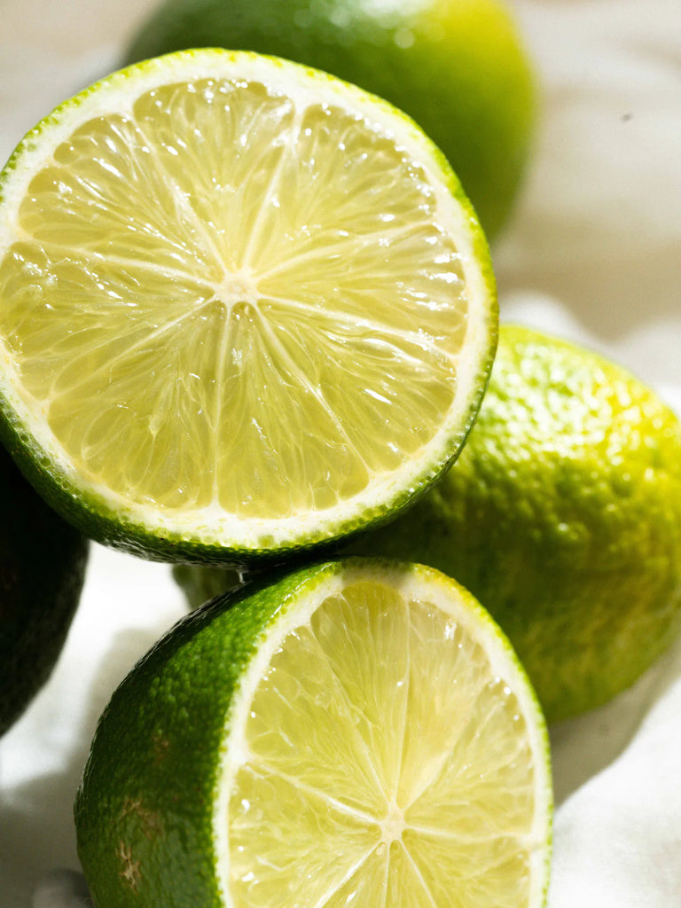 close up of limes cut in half