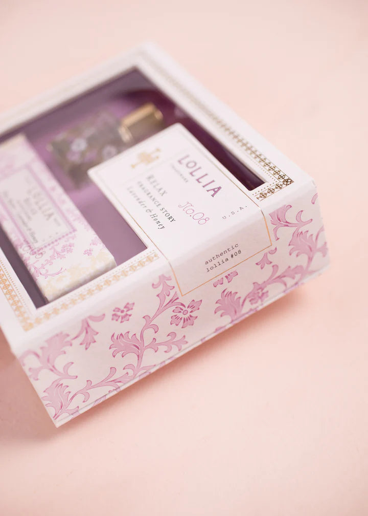 Lollia soap set in a decorative box on a pink background