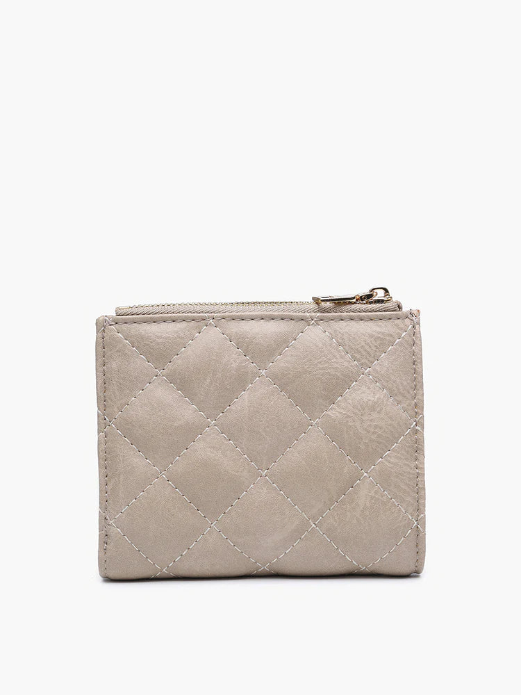 melody quilted wallet on a white background