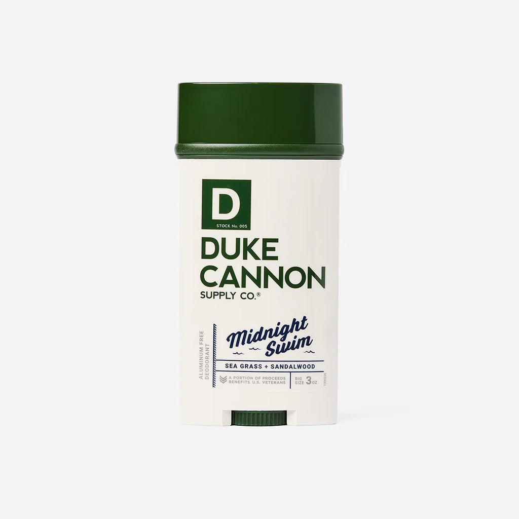 duke cannon midnight swim deodorant on a white background