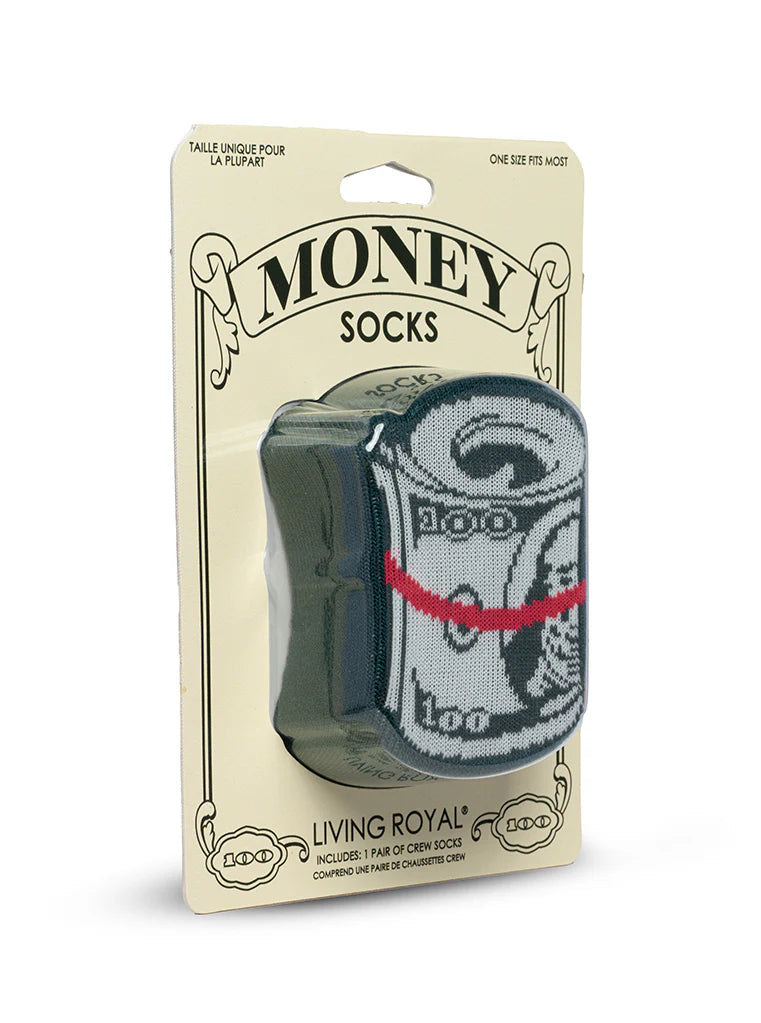 Packaged money-themed socks with 'Living Royal' branding on a beige background