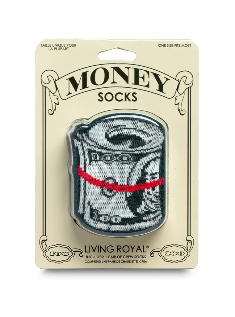 Packaged socks with money design on a beige background