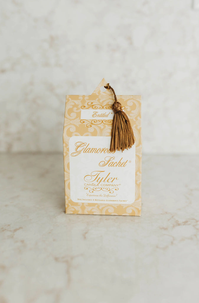 Tyler candle company sachet on a marble background