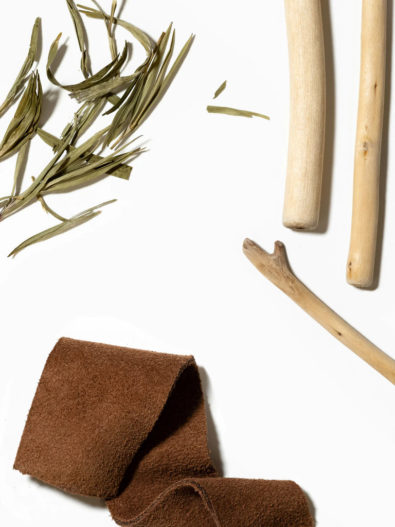 leather and teak close up on a white background