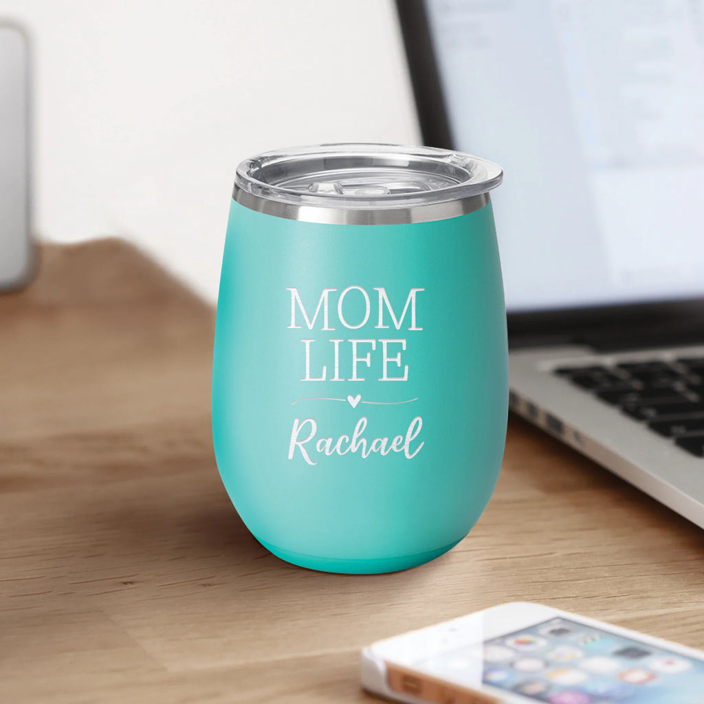 personalized stemless cup on a wood desk