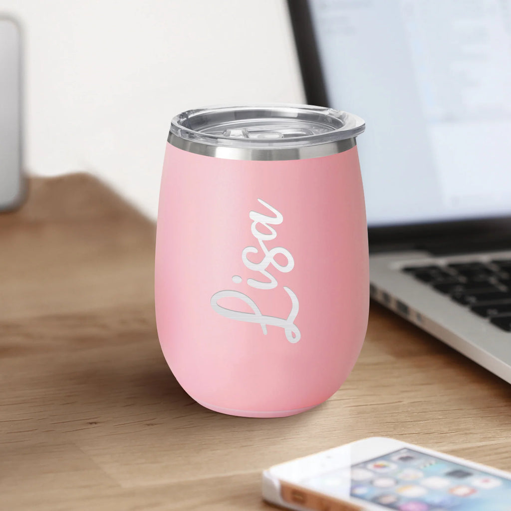 personalized stemless cup on a wood desk