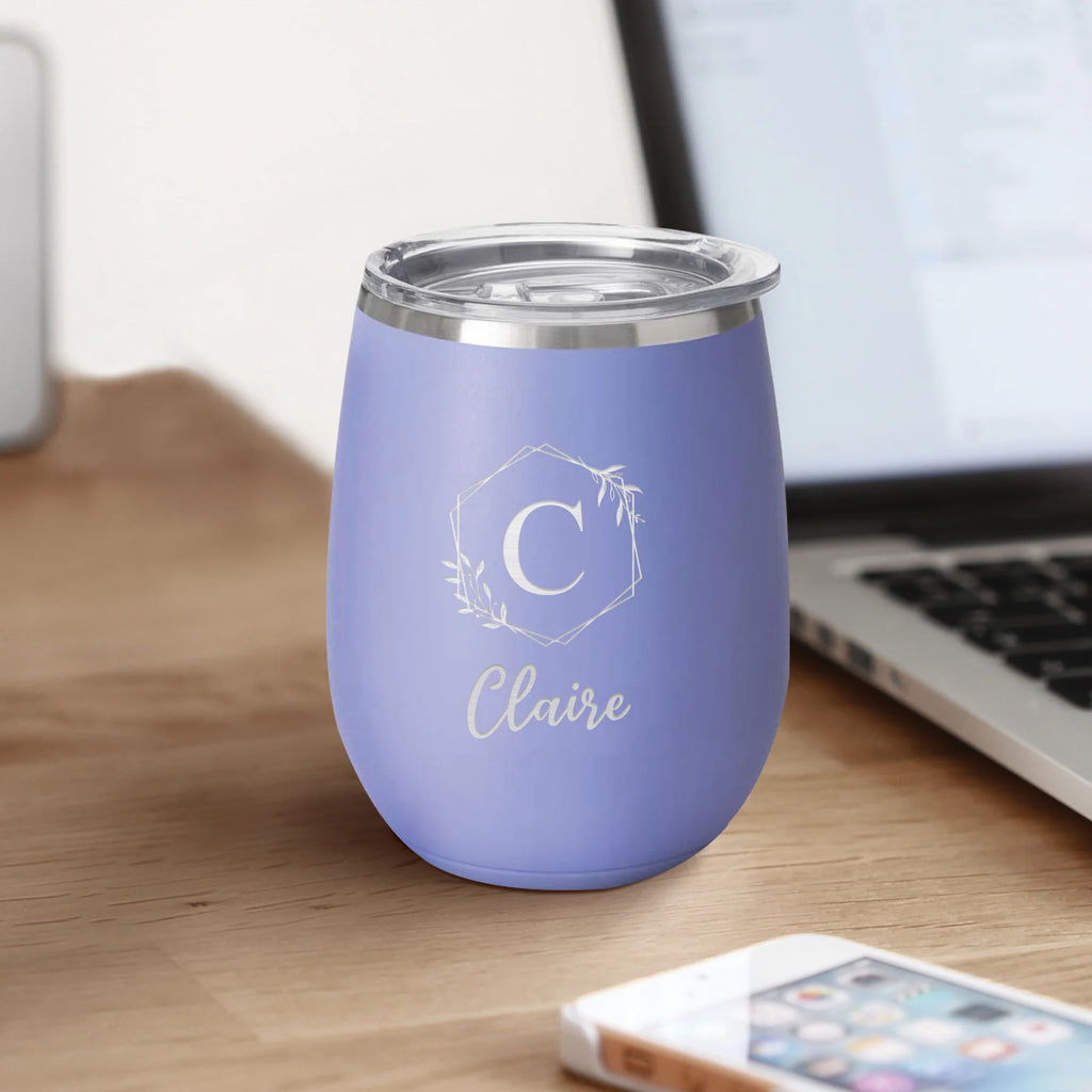 personalized stemless cup on a wood desk